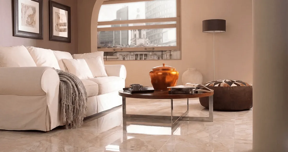 Modern living room with professionally installed marble flooring, a beige sofa, coffee table in Myrtle Beach, SC